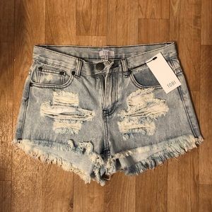 Tobi light wash mid rise jean shorts